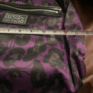 Gently used authentic coach purse purple leopard
